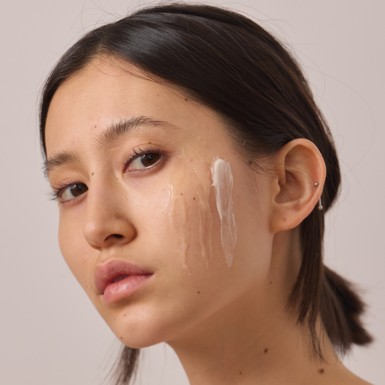 female model with The TRNR Method Skincare Products, Dermatologist-developed and plant-powered, clean and clinically-effective skincare